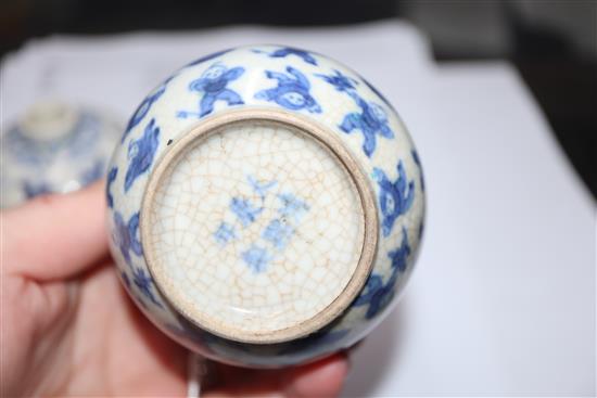 Two Chinese blue and white hundred boys vases, larger 8cm.